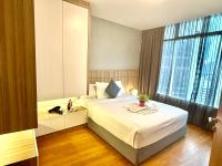 klcc near apartment客房内的一张或多张床位