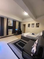 A&G Condotel at 101newport Across NAIA T3客房内的一张或多张床位