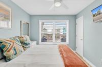 3BR Condo Gulf Views with Pool, Boat Launch and Dock客房内的一张或多张床位