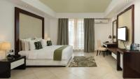 Peninsula Hotel Dar Es Salaam客房内的一张或多张床位