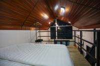 Casa Damai Janda Baik - RIVERVIEW TINY HOUSE客房内的一张或多张床位