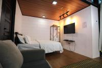 Casa Damai Janda Baik - RIVERVIEW TINY HOUSE客房内的一张或多张床位