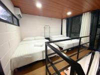 Casa Damai Janda Baik - RIVERVIEW TINY HOUSE客房内的一张或多张床位