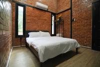 Casa Damai Janda Baik - RIVERVIEW TINY HOUSE客房内的一张或多张床位