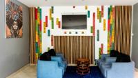 Peninsula Hotel Dar Es Salaam的休息区