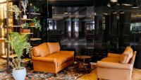 Peninsula Hotel Dar Es Salaam的休息区