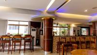 Peninsula Hotel Dar Es Salaam餐厅或其他用餐的地方