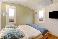 Tiny House im Grünen客房内的一张或多张床位