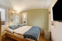 Tiny House im Grünen客房内的一张或多张床位
