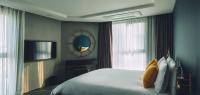 Hotel Alice and Trunk客房内的一张或多张床位