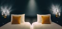 Hotel Alice and Trunk客房内的一张或多张床位