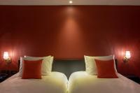 Hotel Alice and Trunk客房内的一张或多张床位