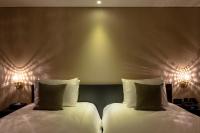 Hotel Alice and Trunk客房内的一张或多张床位