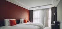 Hotel Alice and Trunk客房内的一张或多张床位