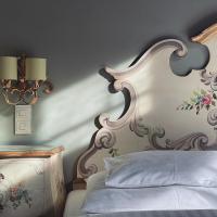 Das REGINA Boutiquehotel客房内的一张或多张床位