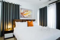 Accra Luxury Apartments at The Gallery客房内的一张或多张床位
