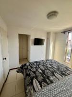 Hostel Tu Espacio RE - Casa cerca del Aeropuerto客房内的一张或多张床位