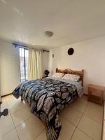 Hostel Tu Espacio RE - Casa cerca del Aeropuerto客房内的一张或多张床位