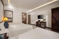 RAON Old Quarter Hotel客房内的一张或多张床位