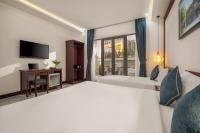 RAON Old Quarter Hotel客房内的一张或多张床位