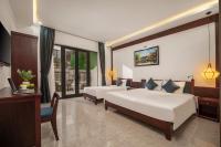 RAON Old Quarter Hotel客房内的一张或多张床位