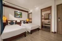 RAON Old Quarter Hotel客房内的一张或多张床位