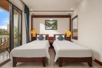 RAON Old Quarter Hotel客房内的一张或多张床位