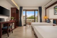 RAON Old Quarter Hotel客房内的一张或多张床位