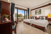 RAON Old Quarter Hotel客房内的一张或多张床位