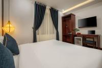 RAON Old Quarter Hotel客房内的一张或多张床位