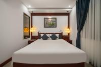 RAON Old Quarter Hotel客房内的一张或多张床位