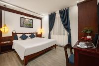 RAON Old Quarter Hotel客房内的一张或多张床位