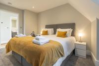 Bond House by Celador Apartments客房内的一张或多张床位