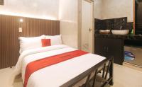 RedDoorz at MBB Room NAIA 2客房内的一张或多张床位