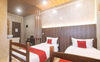 RedDoorz at MBB Room NAIA 2客房内的一张或多张床位