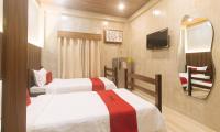RedDoorz at MBB Room NAIA 2客房内的一张或多张床位
