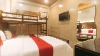 RedDoorz at MBB Room NAIA 2客房内的一张或多张床位
