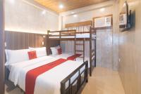 RedDoorz at MBB Room NAIA 2客房内的一张或多张床位