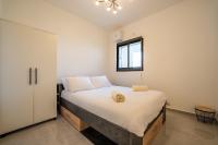Amalfi Apartment - By Harim客房内的一张或多张床位