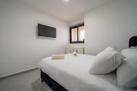 Amalfi Apartment - By Harim客房内的一张或多张床位