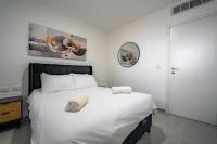 Amalfi Apartment - By Harim客房内的一张或多张床位
