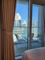 Studio One Dubai Marina - TIE Vacation Homes客房内的一张或多张床位