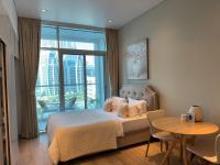 Studio One Dubai Marina - TIE Vacation Homes客房内的一张或多张床位