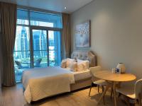 Studio One Dubai Marina - TIE Vacation Homes客房内的一张或多张床位
