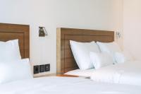 Hotel Jeonju Hanok Village客房内的一张或多张床位
