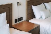Hotel Jeonju Hanok Village客房内的一张或多张床位