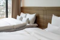 Hotel Jeonju Hanok Village客房内的一张或多张床位