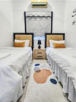 Pelosok Homestay with Pool Meru Klang Selangor客房内的一张或多张床位
