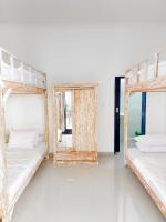 Ceria House Ungasan Uluwatu客房内的一张或多张床位