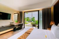 Big Dragon Villas Ubud客房内的一张或多张床位
